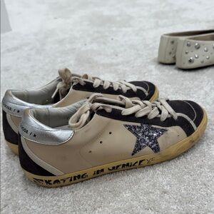 Golden Goose Black and Cream Sneakers with Silver Accents